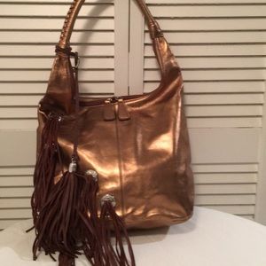 Chi by Falchi shoulder bag with leather fringe.